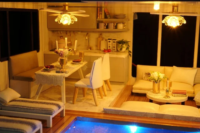 CUTEROOM Lit dining area opening onto the Time Apartment pool